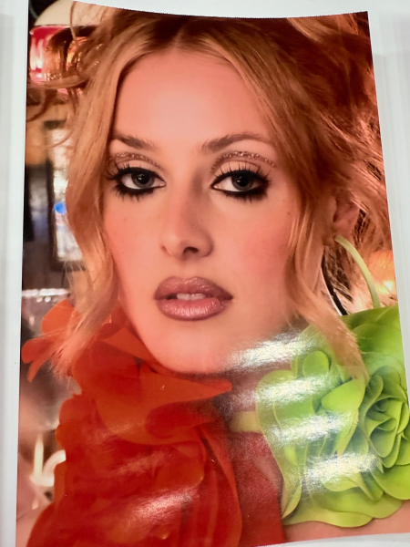 A photo of a photo of Anna Van Patten in her Euphoria makeup look from inside the Euphoria season 3 makeup trailer.