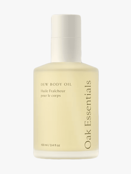 Oak Essentials Dew Body Oil in branded component on a light gray background